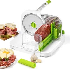 lot 4116 image: Starfrit Deli Slicer, 6.5 Blade, Adjustable, Bonus 2-in-1 Peeler  Slices meat, cheese and bread. Adjustable thickness. 6.5 stainless blade. Ideal for deli prep. Bonus peeler.