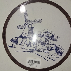 lot 20188 image: Delft Windmill Scene Hooped Art piece featuring a classic blue and white design.