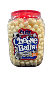 lot 4998 image: Utz Cheese Balls White Cheddar 23 oz exp date 81726 - Retail $0
