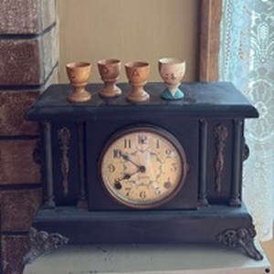 lot 213 image: Vintage Sessions Mantel Clock with Decorative Face and Four Wooden Egg Cups