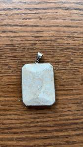 lot 220 image: Rectangular Stone Pendant with Fossils
