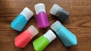lot 222 image: NEW (6) Go Gear Silicone Travel Squeeze Bottles 3fl oz -1.25 fl oz