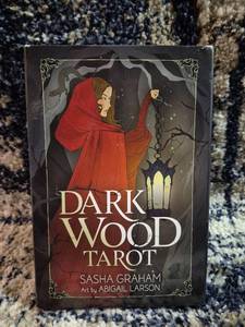 lot 119 image: Dark Wood Tarot by Sasha Graham Art by Abigail Larson Deck & Guidebook