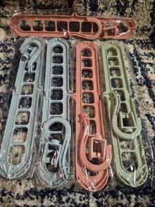 lot 181 image: Plastic Hanging Closet Organizer Strips 5-Piece Set Multiple Colors