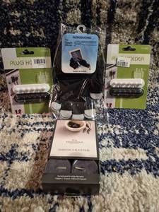 lot 309 image: Lot of 4 Items Touch Glove, 2 Plug Holders, Threshold Candle