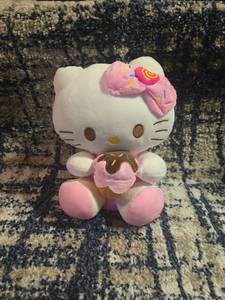 lot 409 image: Hello Kitty Plush Toy with Sprinkle Cupcake and Bow