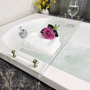 lot 142286 image: Retails for $140 42 Gold Handle transaprent Bathtub Caddy for Luxury Bathroom