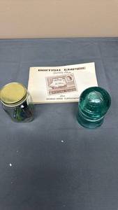 lot 125 image: British Empire Specialty Stamp Album, Blue Glass Insulator, and a Jar of Jacks