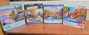 lot 730 image: Jigsaw Puzzle Lot 4 Boxes 300-550 Piece