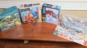 lot 731 image: Puzzle Lot 3 boxes and one bagged puzzle