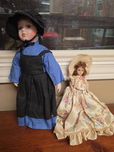 lot 739 image: 2 Dolls with Clothing and Accessories - larger is porcelain, smaller one has sleepy eyes that close