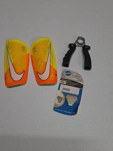lot 755 image: Nike Mercurial Lite Shin Guards 2-pack, Park Tool SW-7 Spoke Wrench and Hand Grip Trainer
