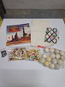 lot 757 image: The Worlds Toughest Golf Holes Book with Golf Balls, Tees, and Accessories
