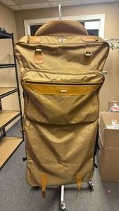 lot 220 image: Samsonite Garment Bag Carry-On Luggage with Handles Gold