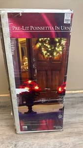 lot 538 image: Pre-Lit Poinsettia In Urn with LED Lights - tested, works.