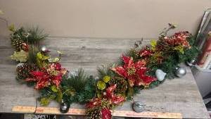 lot 551 image: Christmas Garland with Red Poinsettias, Pine Cones, Yellow Berries and Ornaments