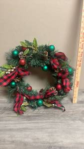 lot 553 image: Christmas Wreath with Evergreen, Ornaments, Pinecones and Buffalo Plaid Ribbon
