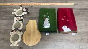 lot 555 image: Snowman Photo Frame, snowman cutting board and Holiday Kitchen Towels Lot