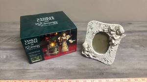 lot 563 image: Yankee Candle and Elements Limited Edition Gift Set in original box and a Cherub picture frame.