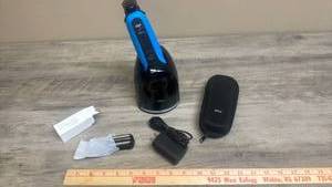 lot 577 image: Braun Electric Shaver Head with Charging Base and Accessories