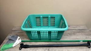 lot 586 image: Turquoise Plastic Laundry Basket with Handles and Ventilation Slots, Broom, and a Vehicle Clothing Hangar Rod (hooks onto clothing hooks in car and hangs across the back seat to hang clothes on - adjustable width)