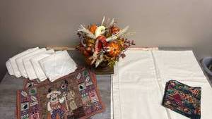 lot 661 image: Harvest Tapestry Tablecloth, Placemats and Napkins Lot with Decorative Fall Arrangement