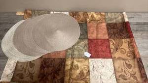lot 663 image: Round Woven Placemat Set Natural Fiber Tan and Multi-color Foliage Pattern Tablecloth