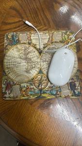 lot 303 image: Apple Wired Mouse with Decorative World Map Mousepad