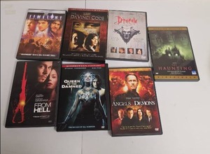 lot 317 image: DVD Movie Lot 7-Disc Collection - Timeline, Da Vinci Code, From Hell, Queen of the Damned, Angels and Demons, Dracula, the Haunting