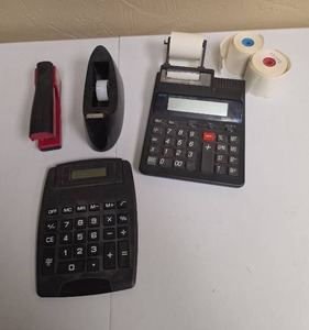 lot 335 image: Royal 560 HD 10-Digit Heavy Duty Printing Calculator, electronic calculator, tape dispenser, and Stapler