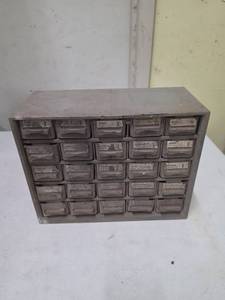 lot 848 image: 25-Drawer Hardware Organizer with Fasteners and Supplies - very dusty on the outside, one drawer has a broken handle