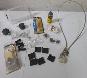 lot 863 image: Mixed Hardware Lot JR Products 4in Spring Loaded Door Holder, Strait-Line Chalk, Gate-House Door Bumpers, Key Rack & More