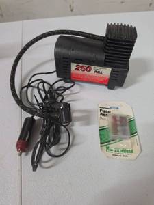 lot 893 image: 250 PSI 12 Volt D.C. Air Compressor with Fuse Assortment