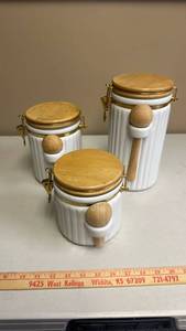 lot 403 image: 3-Piece Canister Set with Wood Lids and Spoons and brass-toned latches