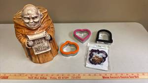 lot 407 image: Cookie Cutter Set - Heart, Bear, Pumpkin and Bell Shapes with Ceramic Monk Thou Shalt Not Steal (Cookies) Cookie Jar