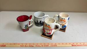 lot 422 image: Ceramic Mugs Lot 4 pcs. 2 Snowmen, New York City, and Mosaic Bull with Red spoon