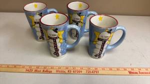 lot 423 image: Heavenly Holiday by J. Weckler Porcelain Set of 4 Mugs Snowman Design