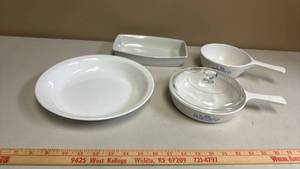 lot 427 image: Corelle Round Serving Plate, SquareOval Dish and 2 Oval Corningware Blue Cornflower Casserole Pans, one with a glass lid