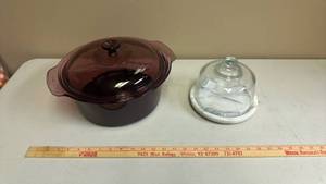 lot 429 image: Large Corning Visions Cranberry Casserole Dish with Lid, and Marble Base Cupcake or Cheese Dish with Glass Dome Lid