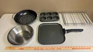 lot 433 image: Colander, Strainer Pan, Griddle Pan, Muffin Tin, and an Under the Cabinet Wine Glass Rack.