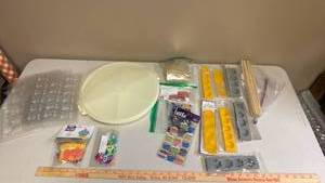 lot 437 image: Candy Making Supplies Lot. Molds, Mats, Stickers, Brushes, Beads and and a storage tub with lid