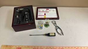 lot 438 image: Wood Boxed Wine Opening and Party Kit - bottom drawer includes glass markers (missing stoppers in bottom drawer), 2 shot glasses and other kitchen utensils