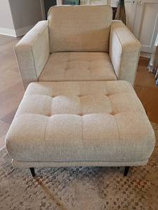 Ashley Furniture Upholstered Chair with Ottoman.  Chair 31 x 35 x 36.  Seat 23 x 24.  Ottoman 16 x 30 x 23.  Matches lot 901