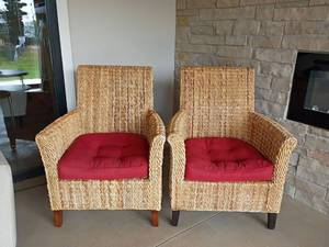 lot 929 image: 2 Wicker Chairs with Chair Cushions.  Very Heavy Duty