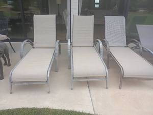 lot 942 image: 3 Outdoor Chaise Lounge Chairs   Most armrests need paint