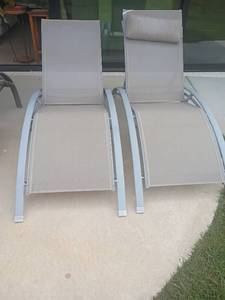 lot 943 image: 2 Outdoor Chaise Lounge Chairs.  One with pillow