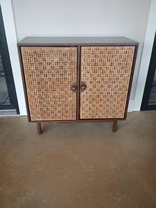 lot 952 image: Two-Door Cabinet with Woven Rattan Panel Doors. 32 x 34 x 14