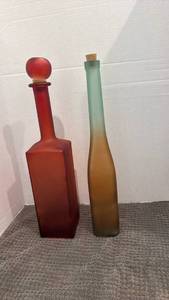lot 1005 image: Decorative Colored glass bottles 18 inches tall