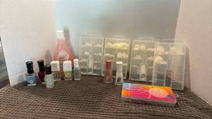 lot 1112 image: Nail polish, tips with glue and nail polish remover