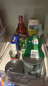 lot 1116 image: Canned tuna, Chicken, Mayo, hot sauce and more in acrylic storage